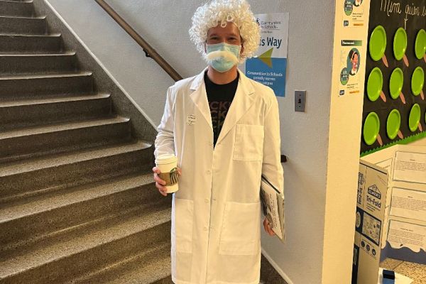 Mr. Barrett in a lab coat